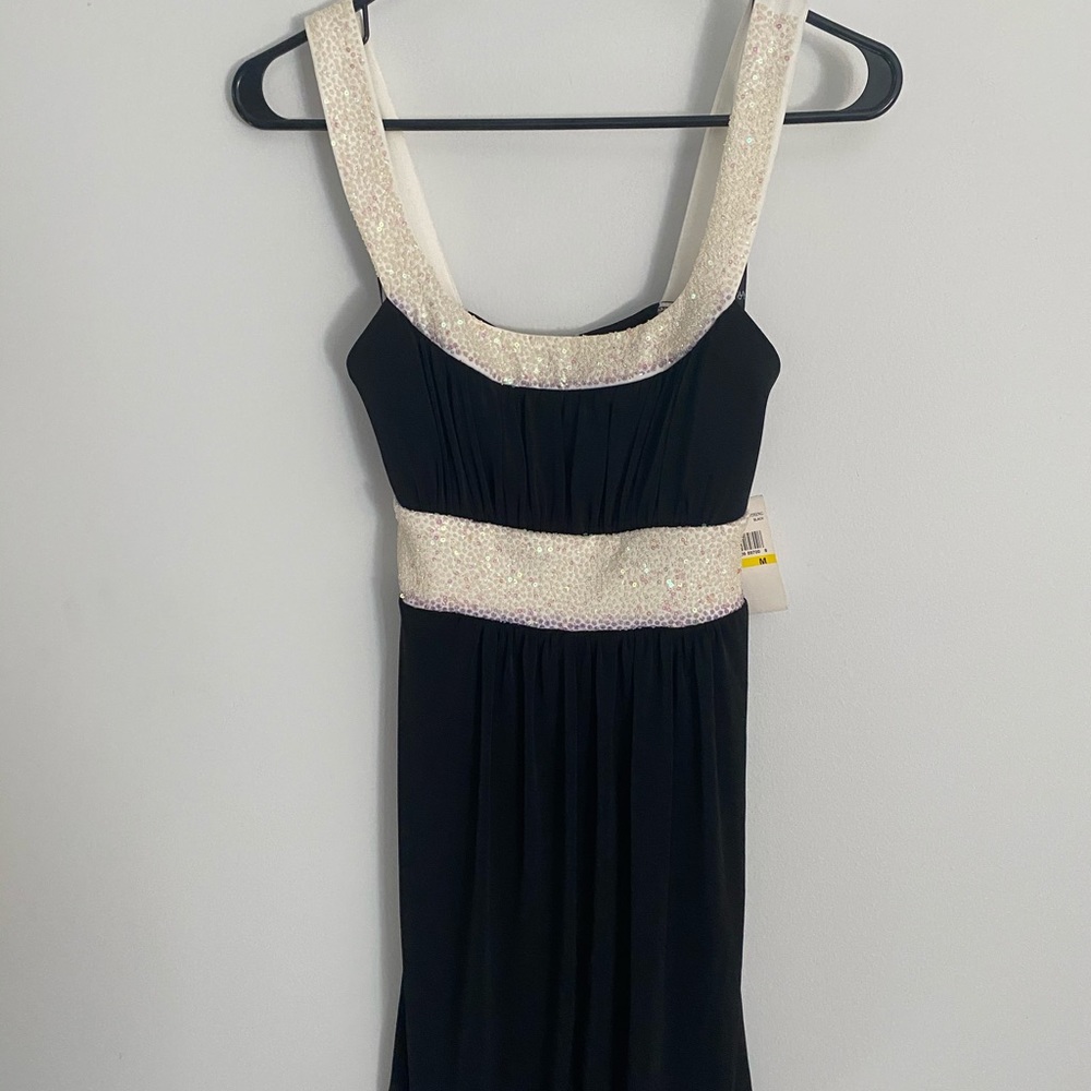 Love Tease black dress with which sequences